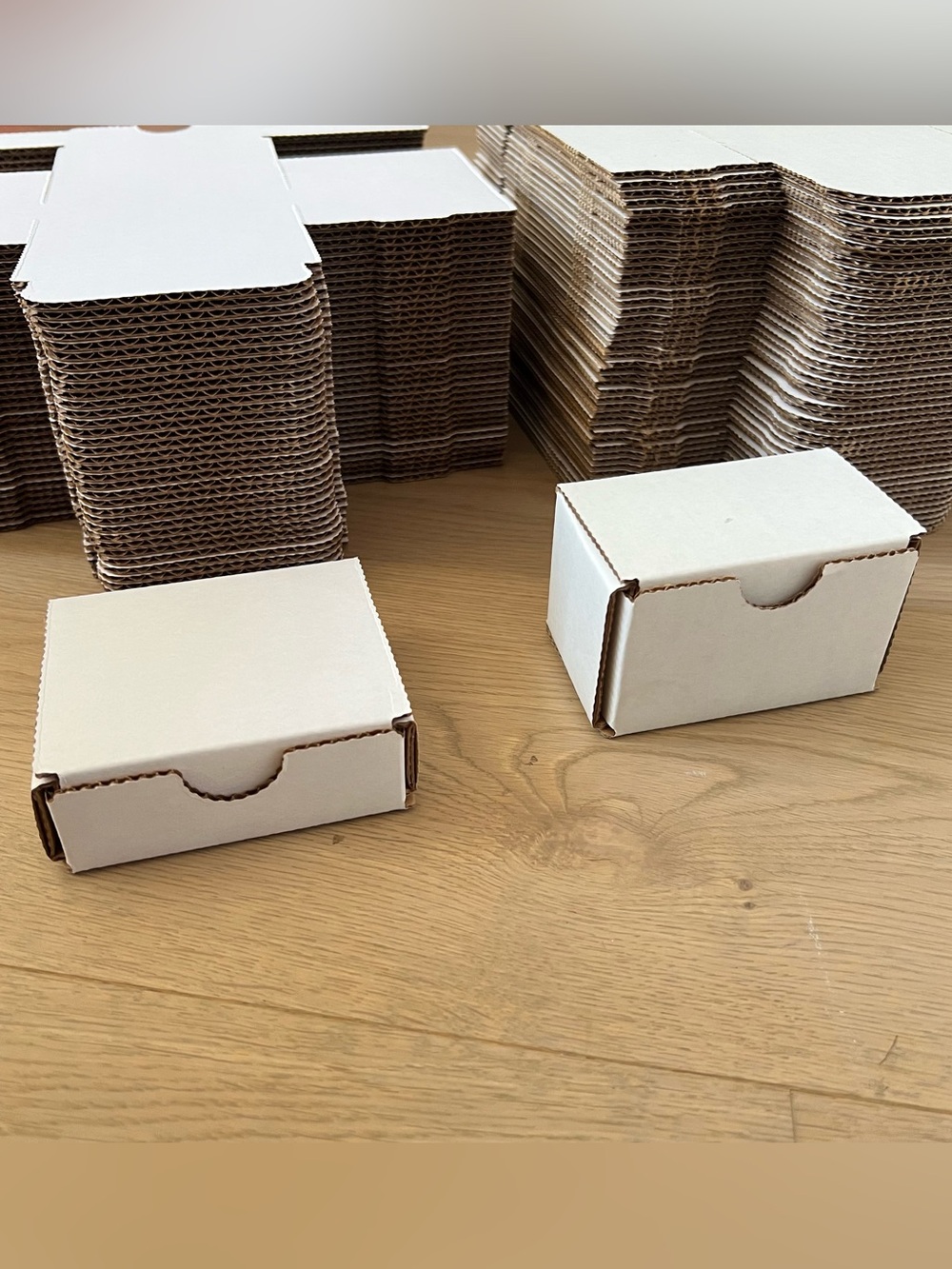 Uline small white “indestructo” cardboard mailer boxes (80 total)